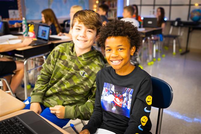 Sunset Middle male students at their desk